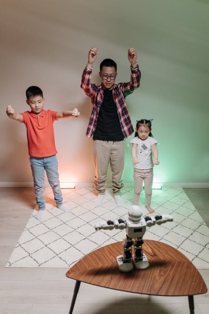pexels-photo-8294827 A family engaged in a fun dance with a robot in the living room.